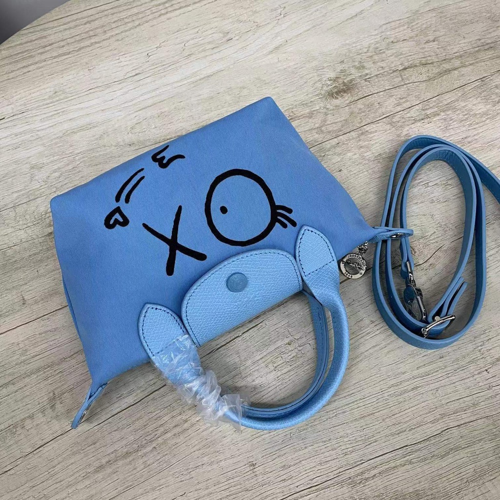 Túi Đeo Chéo Hình Bánh Bao graffiti Nhỏ Gọn Phong Cách Mới Cao Cấp Cho Nữ 77220519 Túi