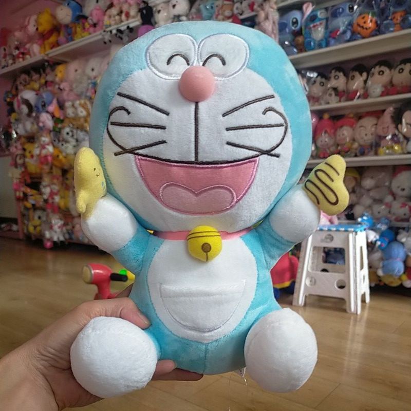 Gấu bông mèo máy Đôrêmon mới 99%