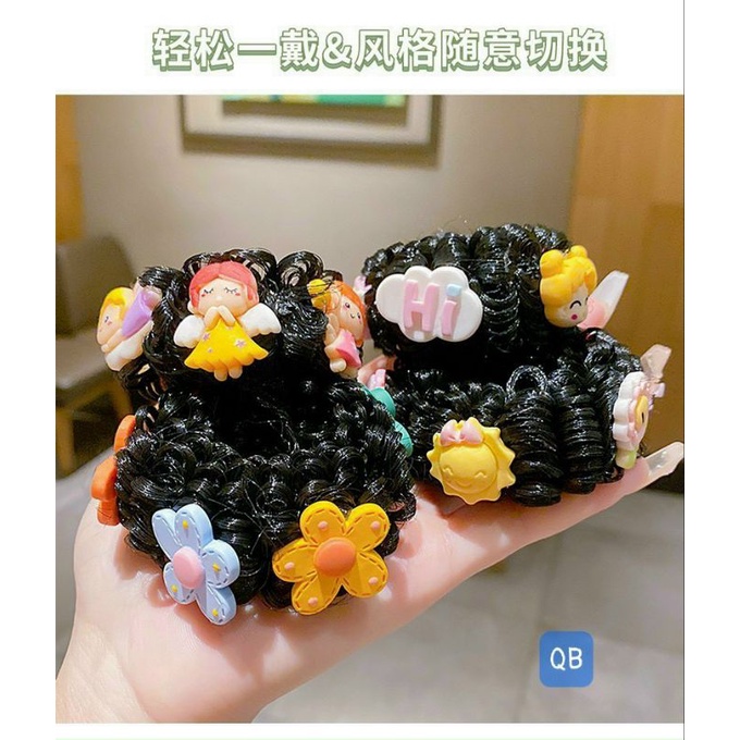 Dây búi tóc đính charm tạo kiểu cho bé.