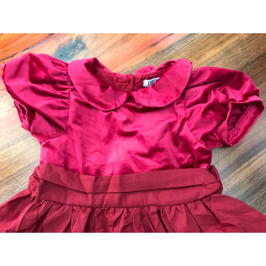 Váy Next đỏ tay bồng cổ sen đính nơ sau