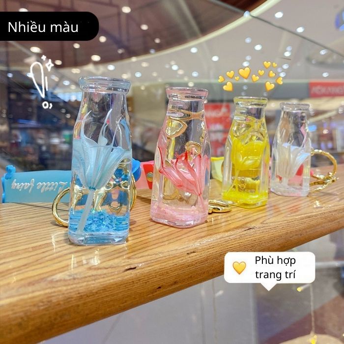 MÓC KHÓA LỌ THỦY TINH CÓ CHỨA BÔNG HOA CỰC KÌ DỄ THƯƠNG