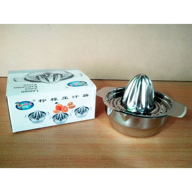 Dụng cụ vắt cam inox