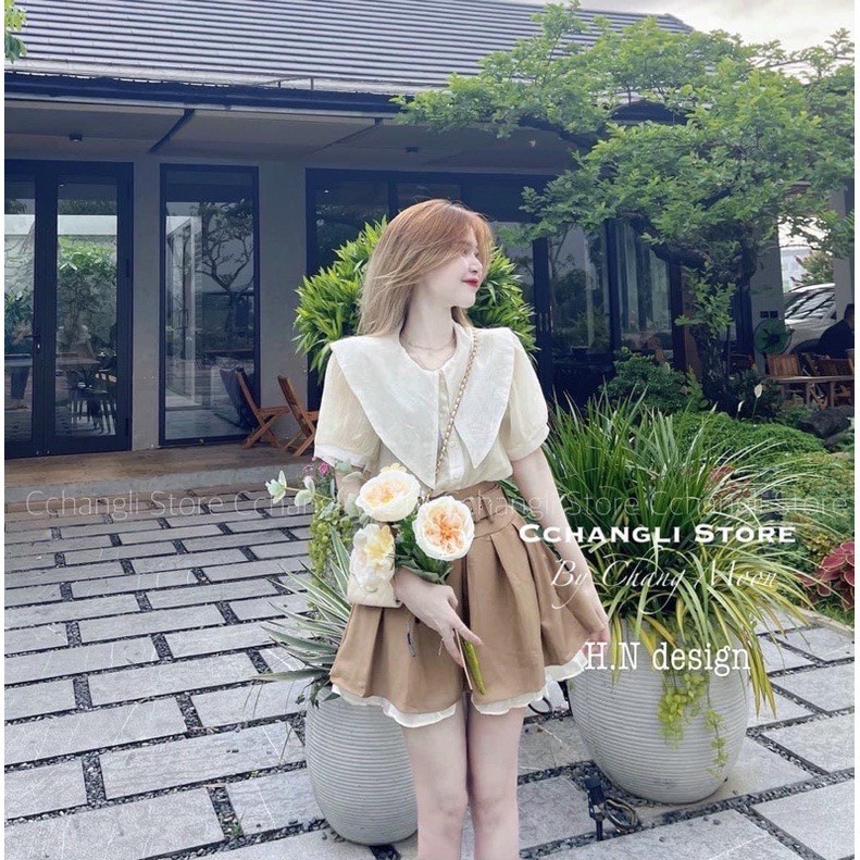 Set bộ lẻ GUU áo sơ mi cổ bèo nhọn màu be kèm chân váy xếp ly dáng ngắn màu nâu tây tôn da phong cách hàn quốc