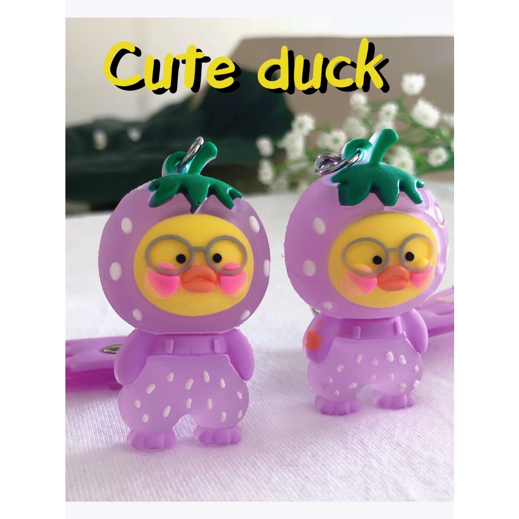 Móc khóa túi cute hoạt hình chú vịt cận dâu tím dễ thương cực hot giá rẻ chất liệu PVC cứng cáp bán chạy nhất hiện nay