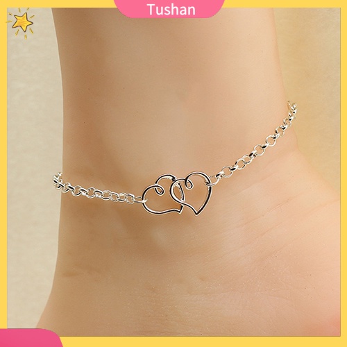 Vòng đeo chân thiết kế trái tim đôi đẹp mắt kết hợp cùng giày xăng đan phù hợp cho dịp đi biển cho nữ