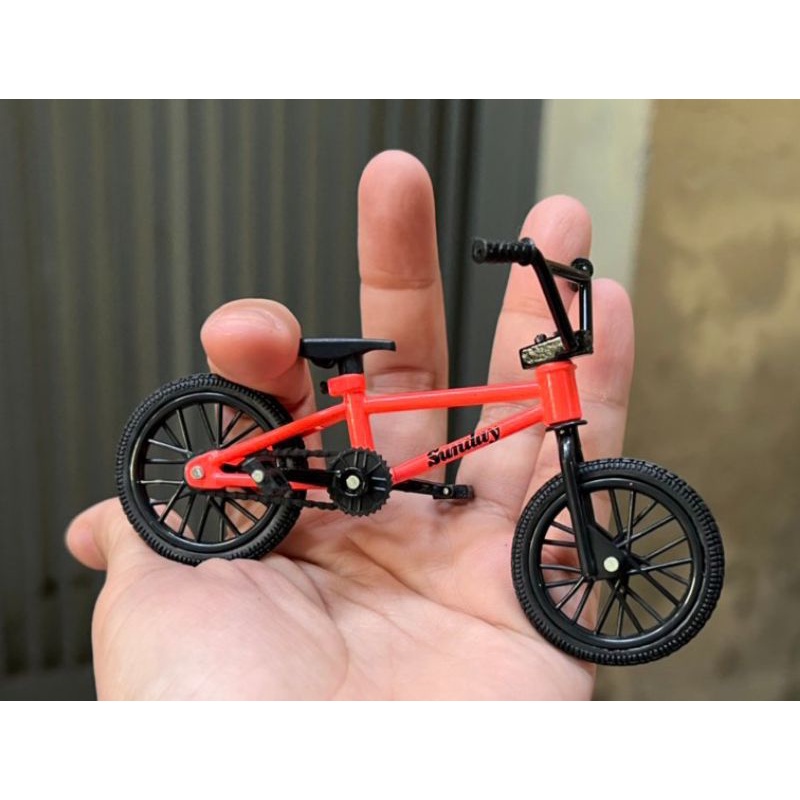 Mô hình xe đạp địa hình Tech dech hãng Spin Master màu đỏ cam