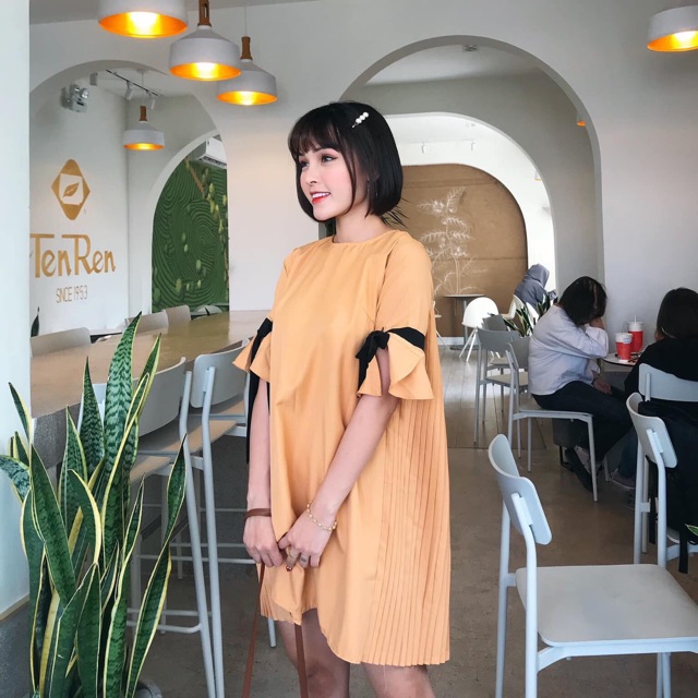 Đầm nơ nơ xinh bầu bì bon chen