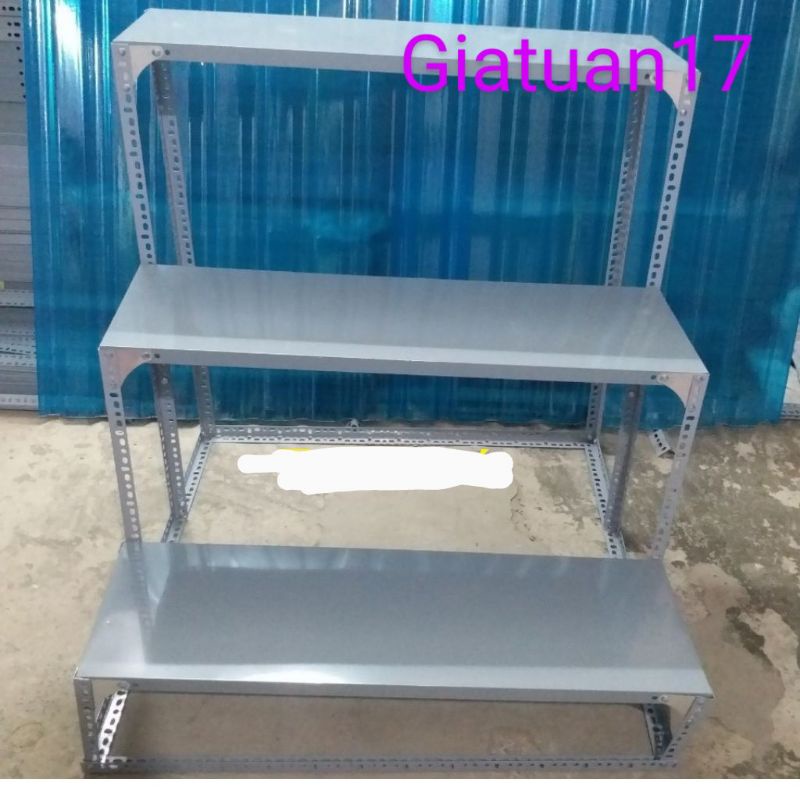 Kệ mâm sắt V lỗ 3 bậc thang ( R40cm, dài 60_80_1m_1.2_1.5m) trụ bằng V3x3cm và V4x4cm