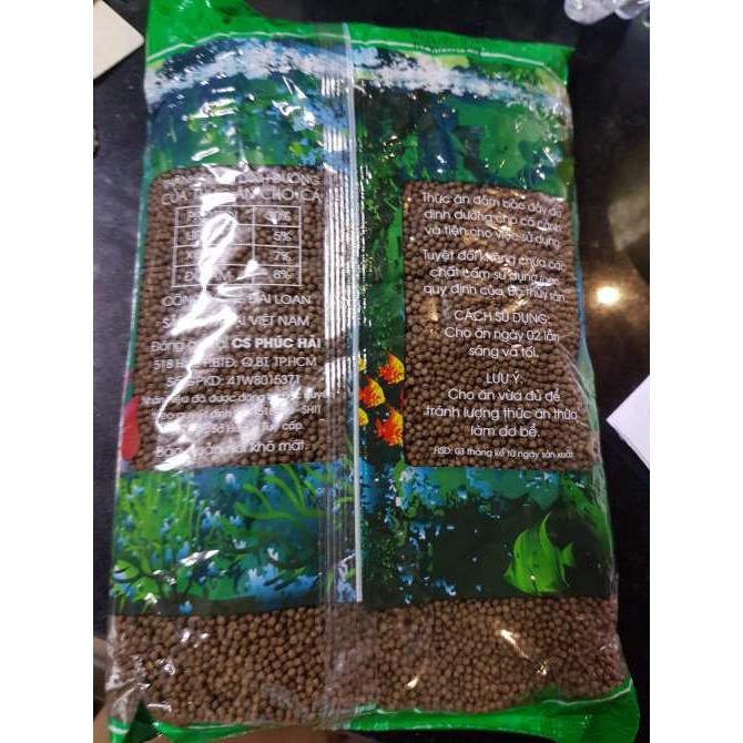 Thức ăn cho cá cảnh gói 500g Shanghai.