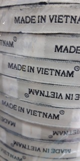Nhãn mác vải may cổ áo