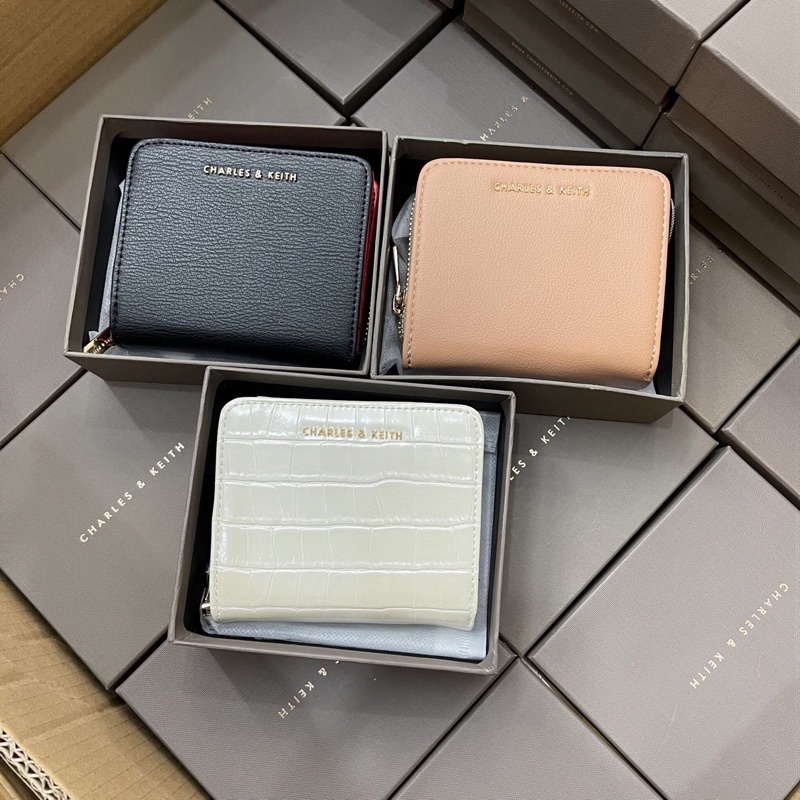 Ví nữ chữ CNKis hàng quảng châu da rắn chữ nổi cầm tay nhiều ngăn đựng thẻ