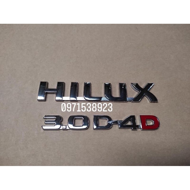 Logo chữ nổi TOYOTA HILUX D4D 3.0 E Gdán đuôi xe