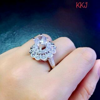 Nhẫn bạc kiểu hoa mai hột trắng cao