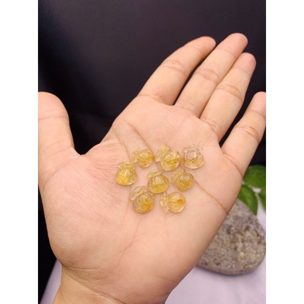 Mặt túi tiền tài lộc tóc vàng