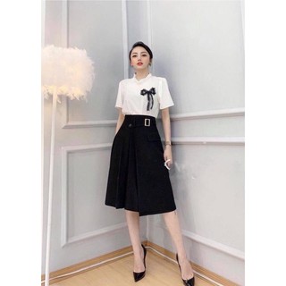 Chân váy chữ A xếp li lệch 1 nắp túi