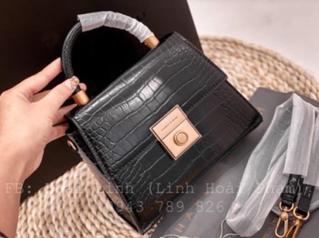 - Túi xách khuy tròn xuất dư