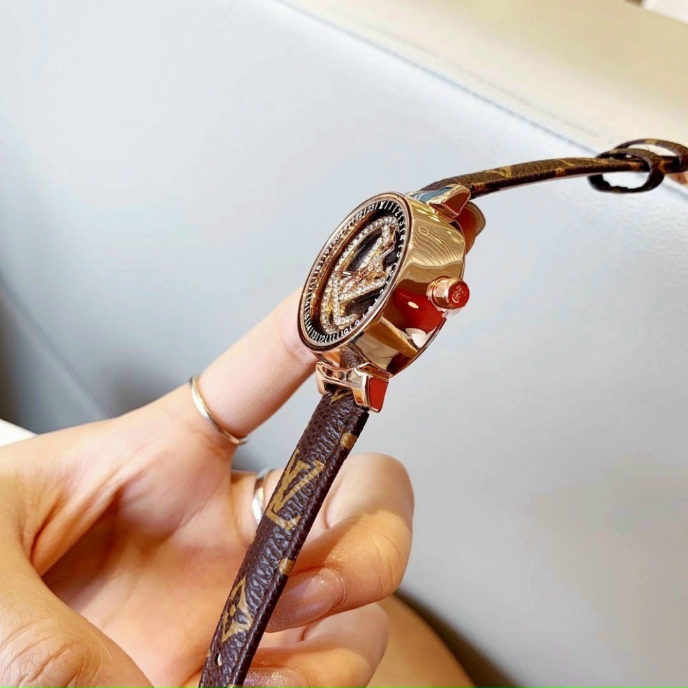 Đồng hồ nữ LV siêu phẩm mặt xoay dây da cực xịn có hoa văn