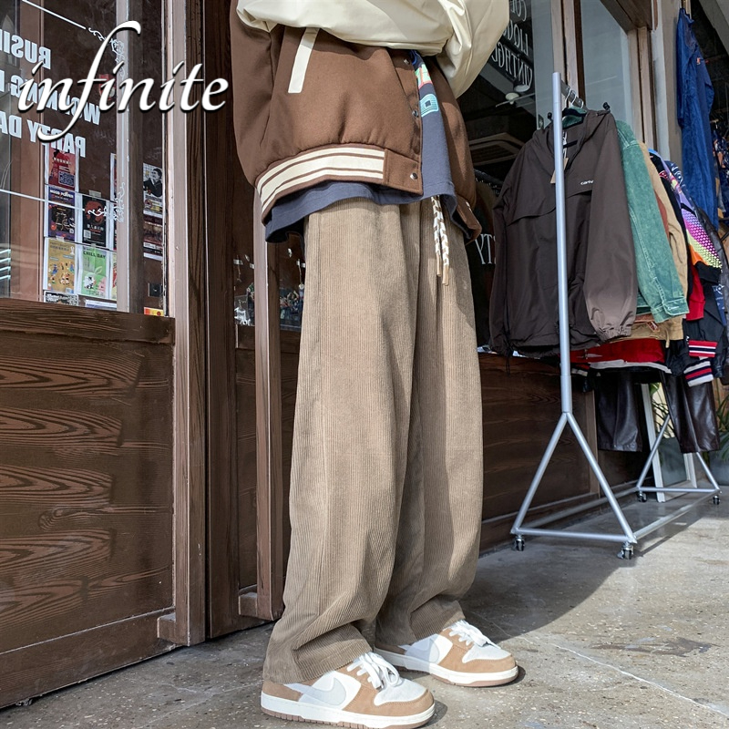 Quần Dài Nam Vải Nhung Kẻ Dáng Rộng Thời Trang Mới