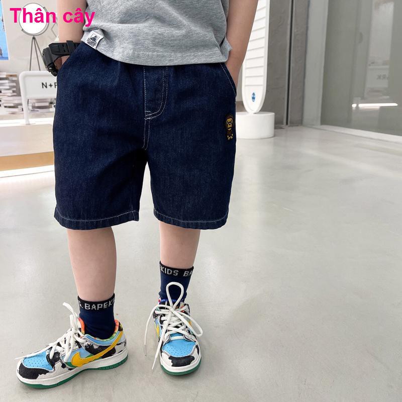 quần bé traiQuần soóc cho bé trai 2021 jean trẻ em mùa hè mới phong cách nước ngoài cắt short denim in rời