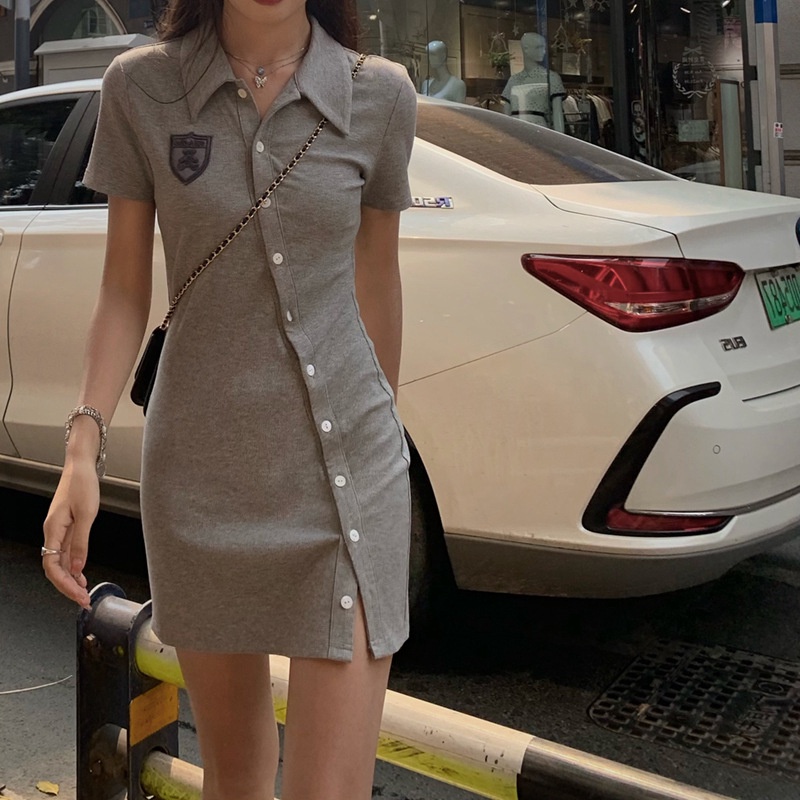 Đầm Polo Body Cúc Lệch Thêu Logo Gấu Xẻ Vạt 2 Màu