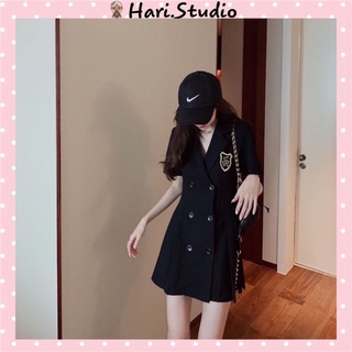 Váy vest xếp ly huy hiệu