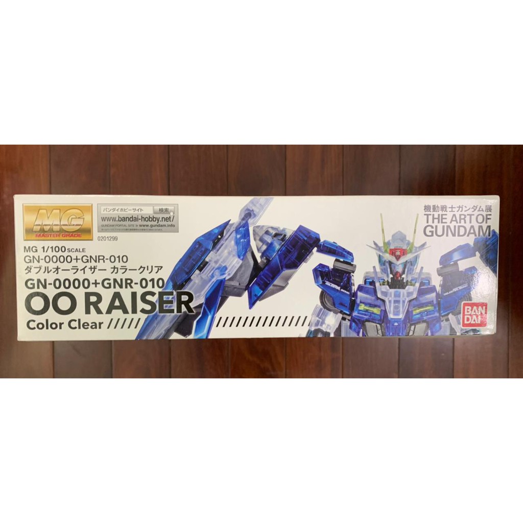 MÔ HÌNH GUNDAM MG 1/100 GN-0000 + GNR-010 OO RAISER COLOR CLEAR CÓ SẴN CHÍNH HÃNG BANDAI