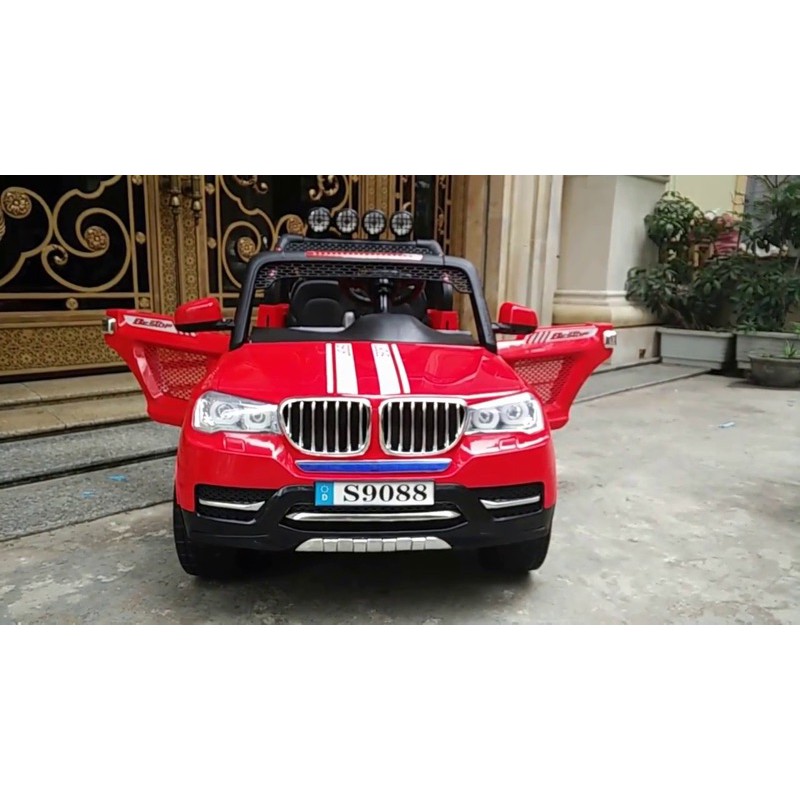 Ô tô điện trẻ em kiểu dáng BMW-S9088 bánh cao su ghế da 4 động cơ