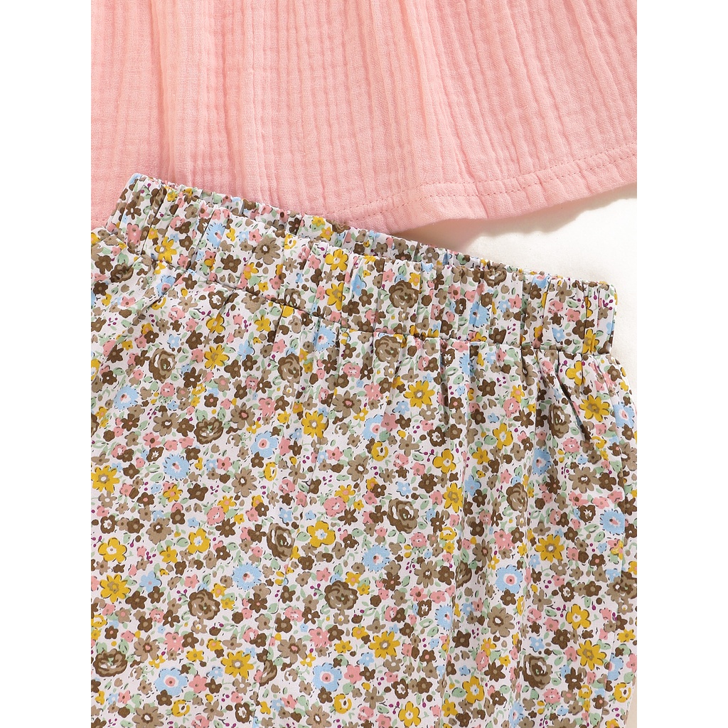 Bộ đồ 2 mảnh MIKRDOO gồm áo tay cộc màu hồng và quần hoa chất liệu vải cotton dành cho bé gái
