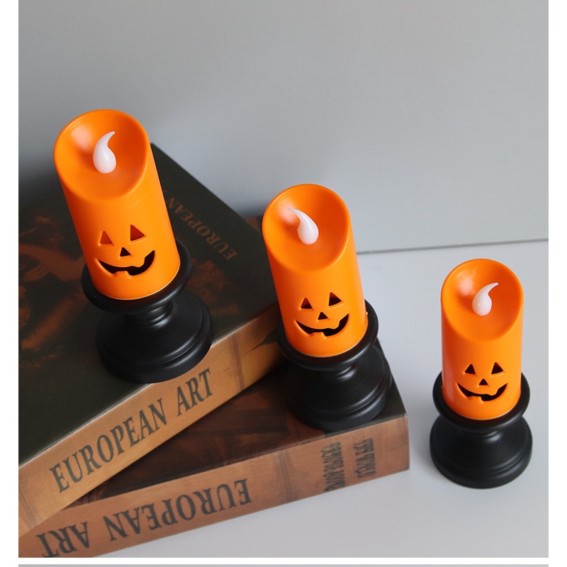 Nến điện tử hình bí ngô trang trí bàn tiệc Halloween