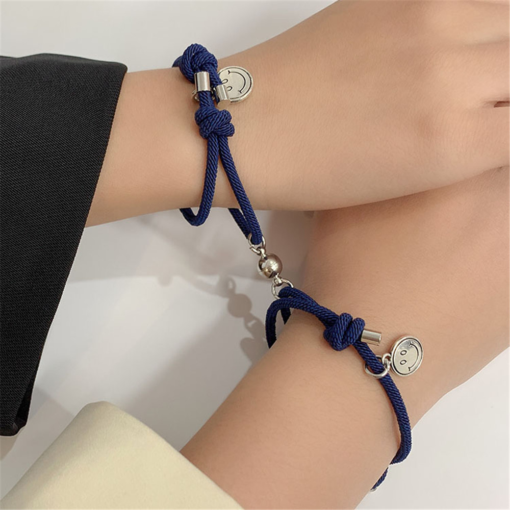 Set 2 vòng đeo tay dây bện gắn chuông và mặt cười đáng yêu dành cho cặp đôi