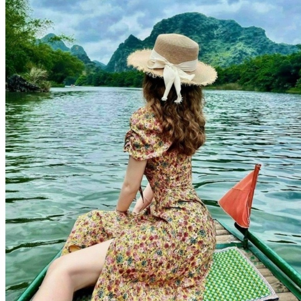 Đầm nữ xẻ tà ngực kết Nơ form dài ( có mút ) dễ thương họa tiết hoa dịu dàng thời trang stclothing