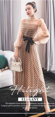 Váy xếp li chấm bi tay bồng