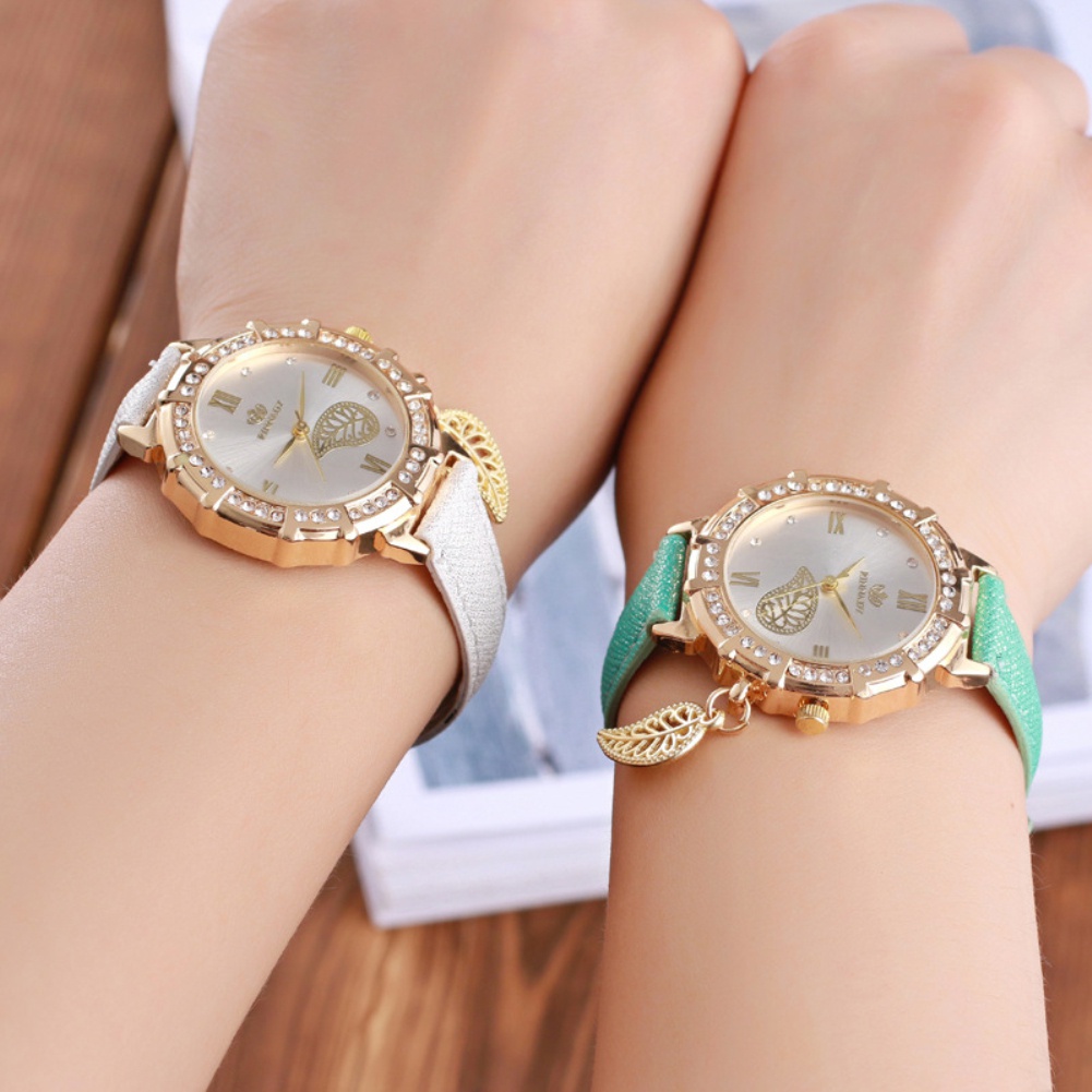 Đồng Hồ Nữ Dây Giả Da Mặt Chiếc Lá Thời Trang