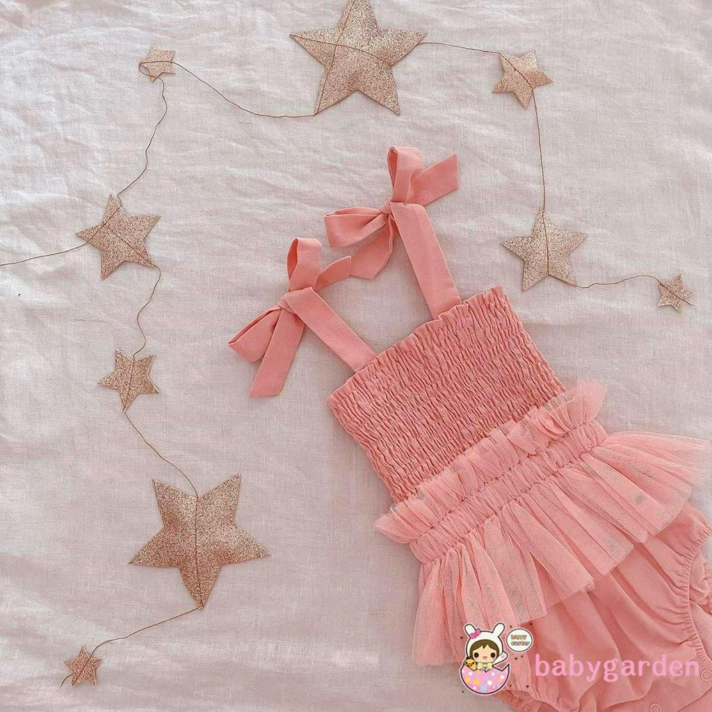 Áo liền quần đính nơ hợp thời trang cho bé gái