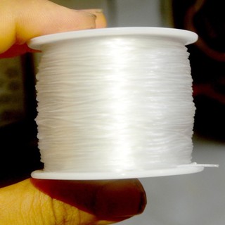 cuộn dây chỉ tơ xỏ chuỗi