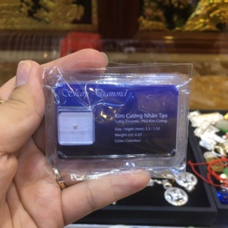 Đá đính răng ( kim cương nhân tạo)a