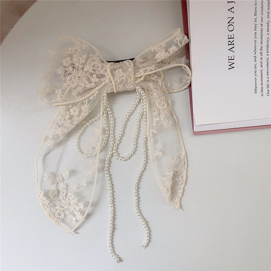 Kẹp tóc đính ngọc trai nhân tạo hình nơ hợp thời trang cho nữ