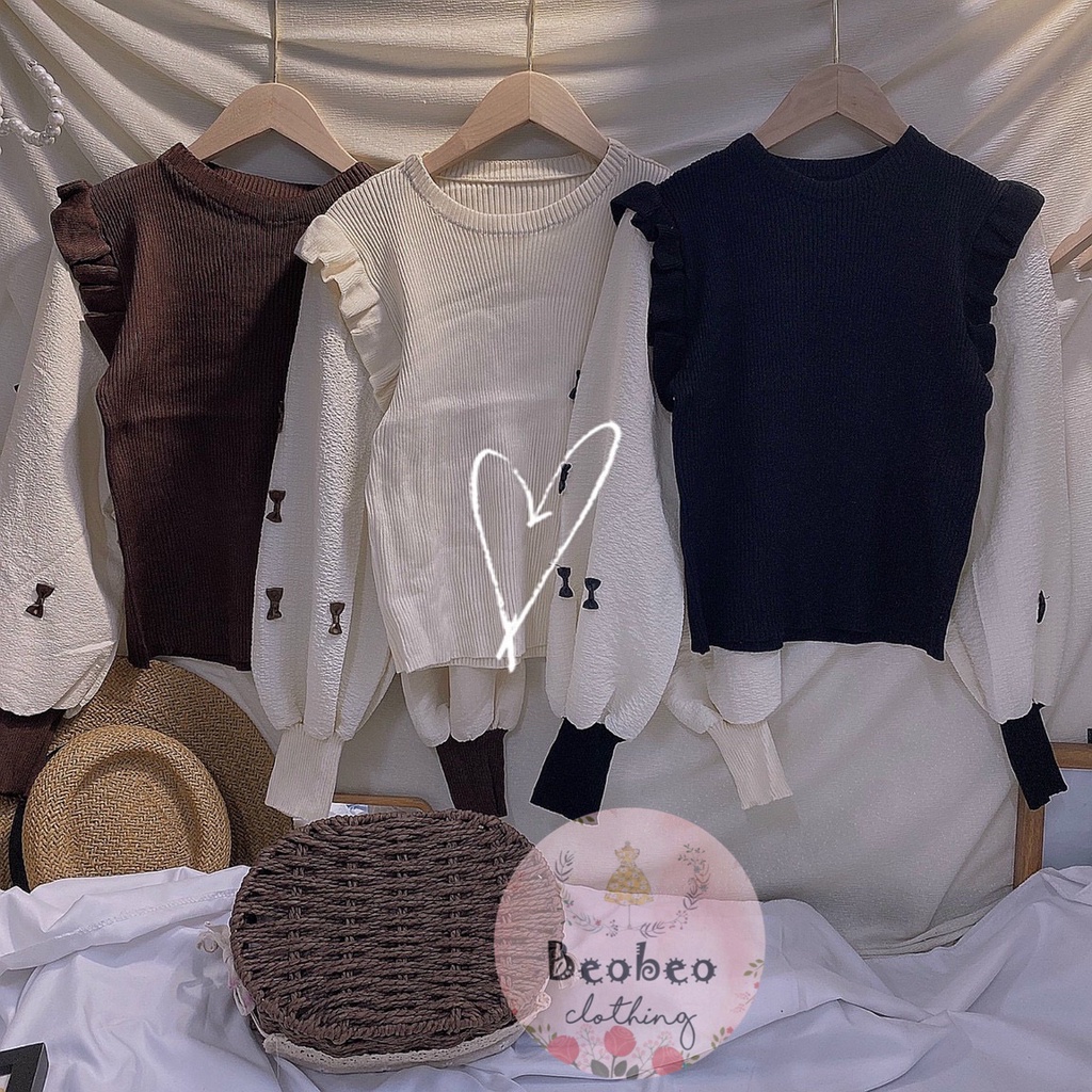 Áo len phối bèo tay phồng nude đính nơ Quảng Châu