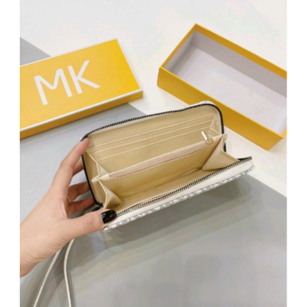 VÍ nữ dài cầm tay MK-V004