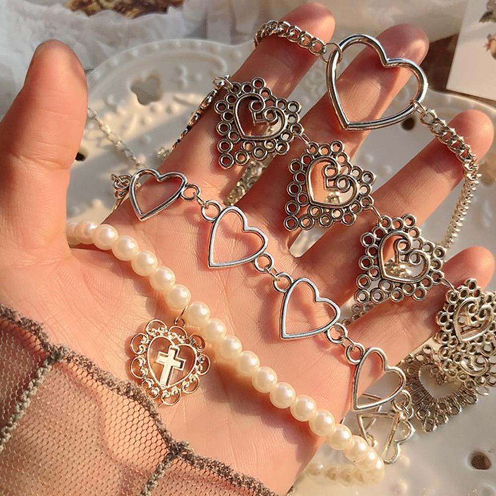 Vòng cổ Thép Không Gỉ Mặt Trái Tim Rỗng Thời Trang