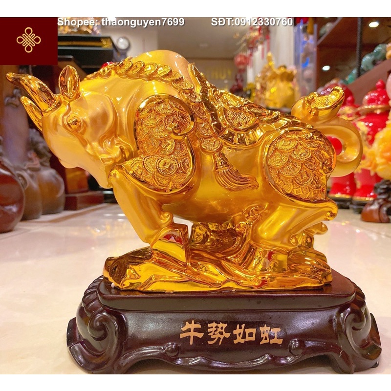 Tượng Trâu Phong thuỷ màu vàng bóng . (cao 24, dài 22,rộng 14)
