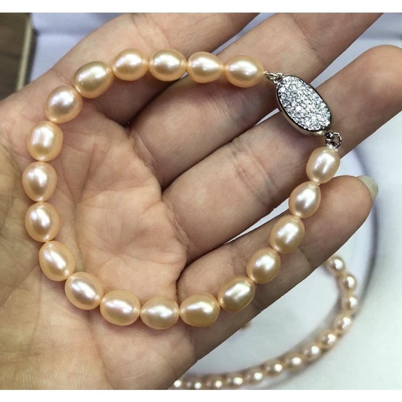 Vòng tay hạt 7-8ly khóa bạc màu hồng cam