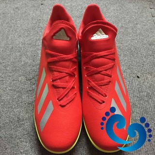 Giày đá bóng X18 đỏ bạc nhân tạo (combo giày+túi)