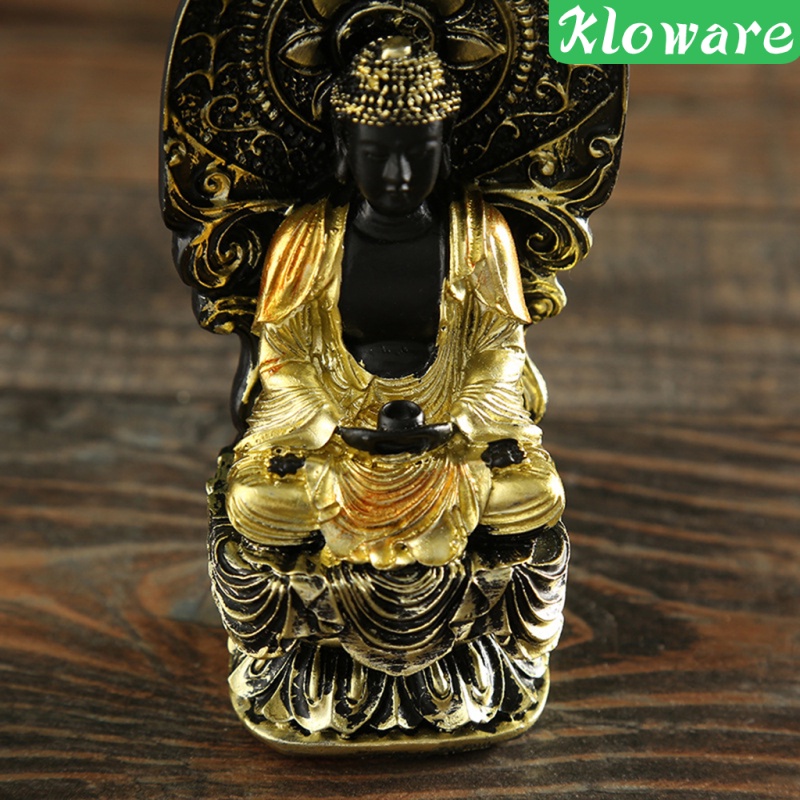 Tượng phật màu vàng và đen dùng để trang trí