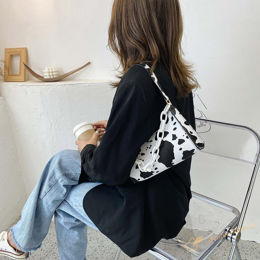 Túi xách da PU kẹp nách hoạ tiết bò | BigBuy360 - bigbuy360.vn