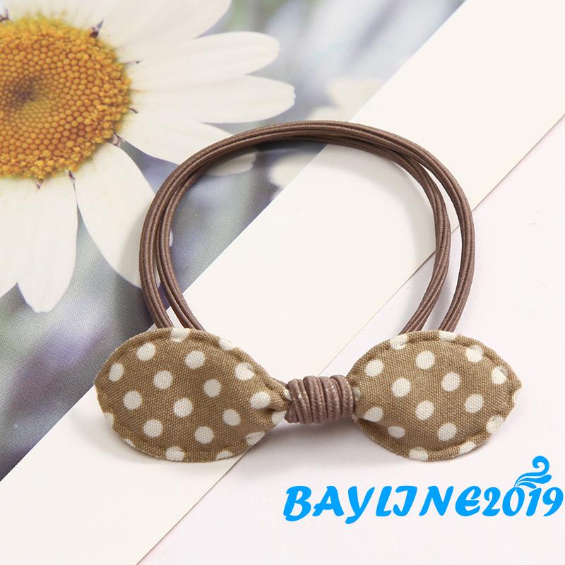 Dây buộc tóc đính nơ họa tiết chấm bi dễ thương cho bé gái