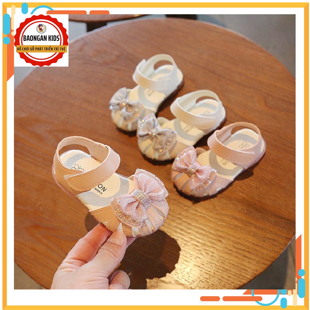 Sandal tập đi cho bé gái đế mềm chống trơn kín mũi đính nơ đáng yêu cho bé từ 0 - 4 tuổi ( A9 )