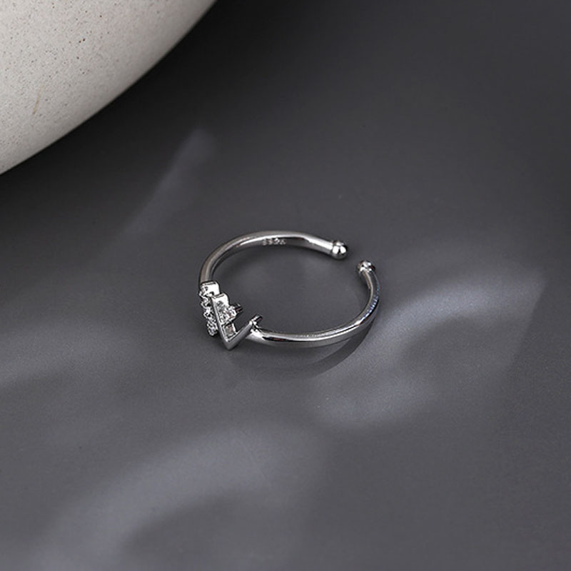 Nhẫn đeo ngón tay kim loại mặt hình chữ W đính đá thời trang unisex