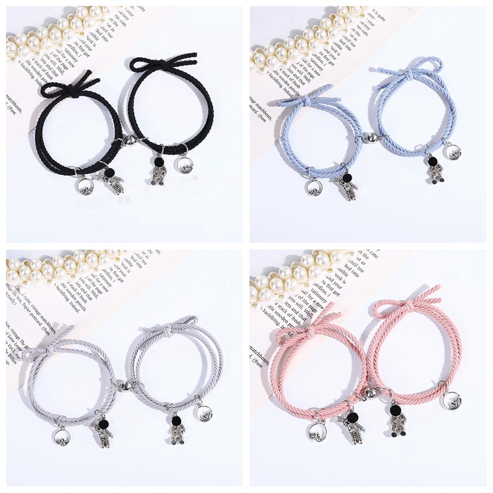 Vòng tay nam châm hình phi hành gia thời trang cho cặp đôi