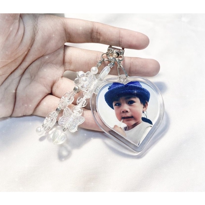 Móc khoá mica trái tim dây hạt cườm